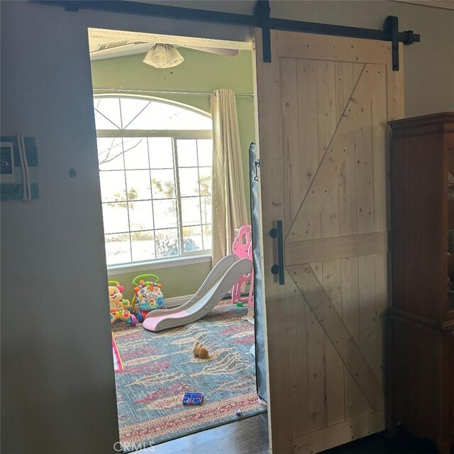 bedroom with a barn door