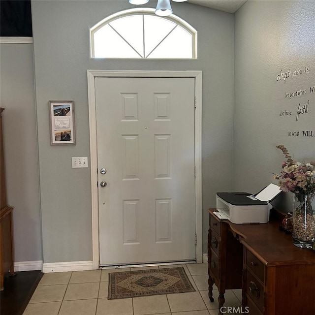 entrance foyer featuring light tile patterned flooring