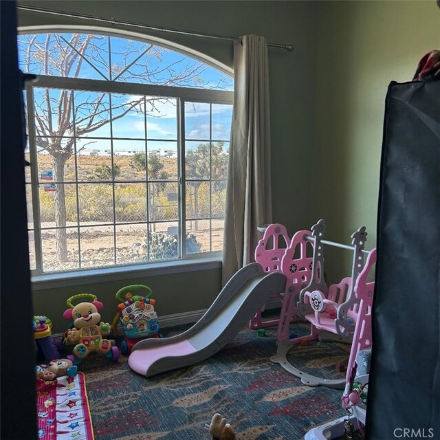 rec room with a wealth of natural light