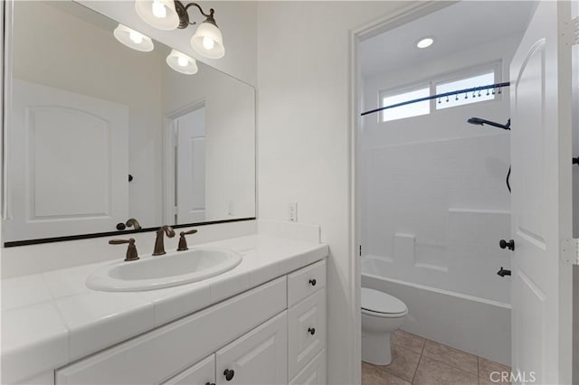 full bathroom with vanity, tile patterned flooring, shower / bathtub combination, and toilet