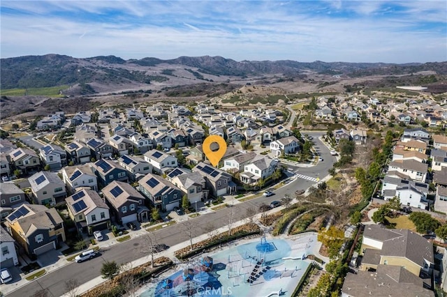 drone / aerial view featuring a mountain view