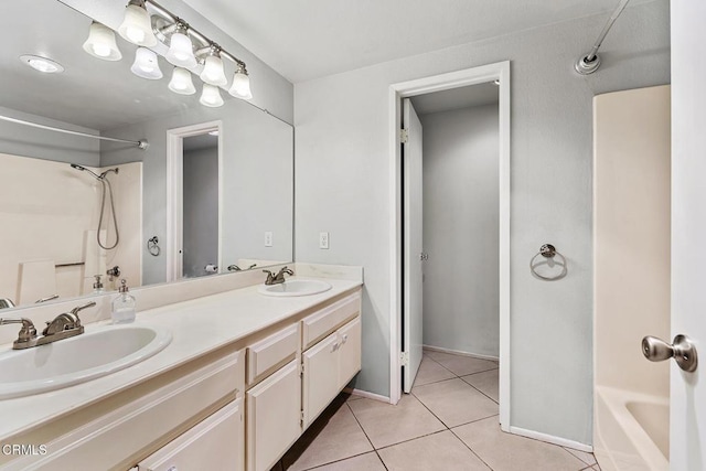 bathroom featuring shower / tub combination, tile patterned floors, and vanity