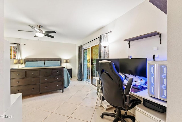 bedroom featuring light tile patterned floors, ceiling fan, and access to exterior