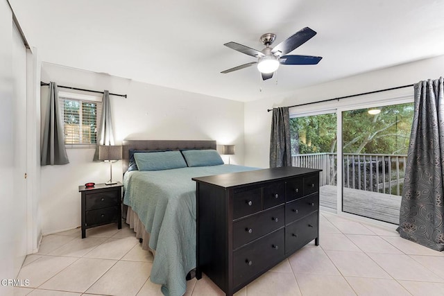 bedroom featuring ceiling fan, access to exterior, and light tile patterned floors