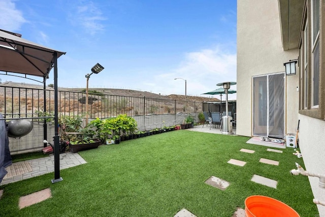 view of yard with a patio area