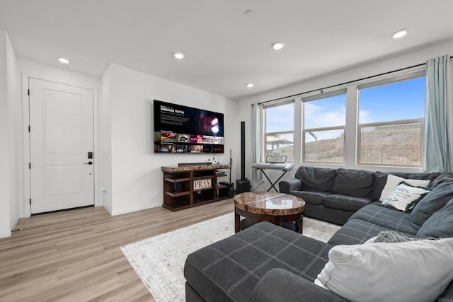 2082 Trevi Cir, Chula Vista, CA 91913 - living room featuring light wood-style flooring, recessed lighting, and baseboards