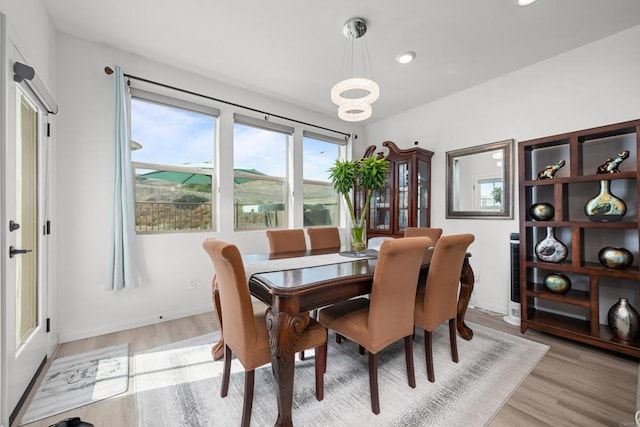 2082 Trevi Cir, Chula Vista, CA 91913 - dining space with light wood-style floors, recessed lighting, baseboards, and a chandelier