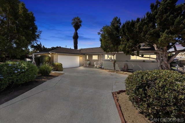 single story home with a garage