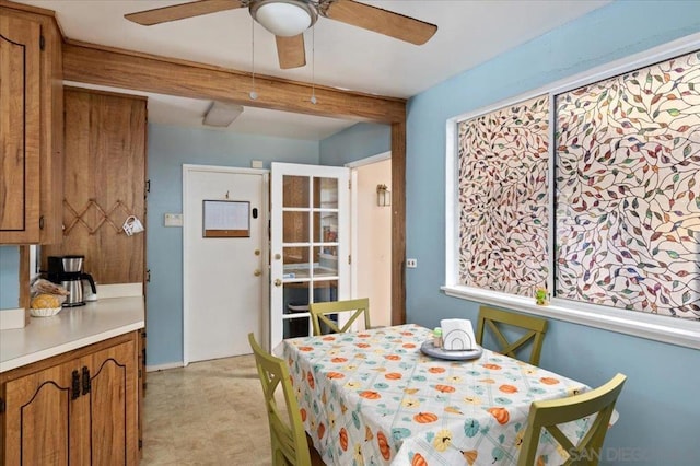 dining space featuring ceiling fan