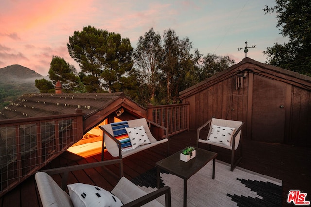 view of deck at dusk