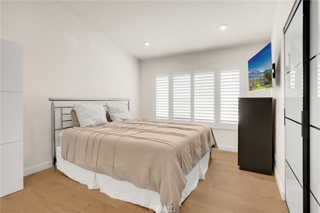 bedroom featuring light wood-type flooring