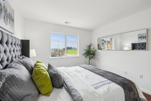 bedroom featuring wood-type flooring