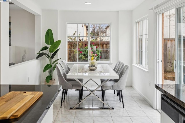 dining room featuring light tile patterned flooring