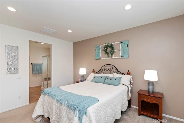 bedroom featuring light colored carpet