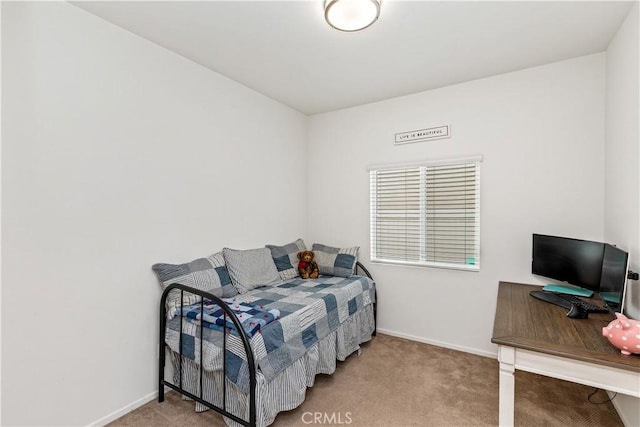 bedroom with light colored carpet