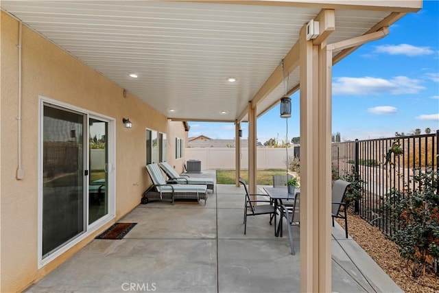 view of patio with central AC