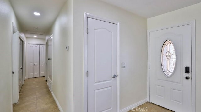 view of tiled foyer entrance