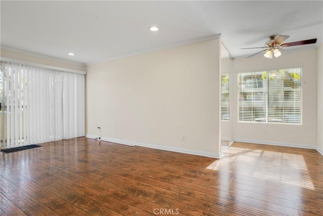 unfurnished room with hardwood / wood-style flooring, ceiling fan, and crown molding