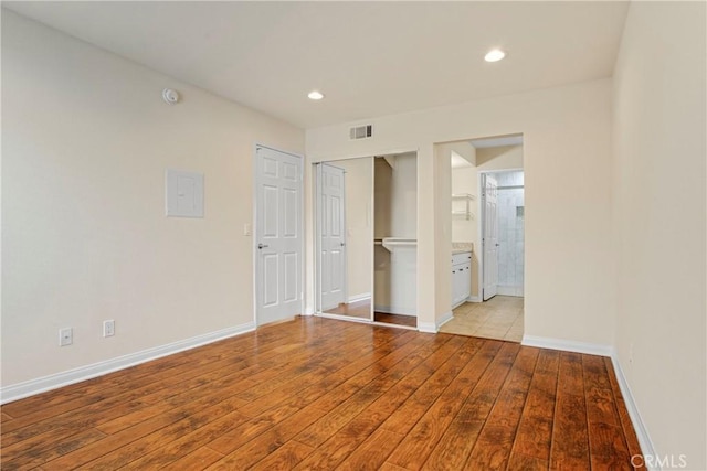 empty room with light wood-type flooring