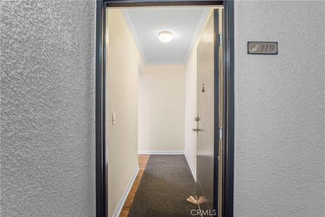 hallway with crown molding