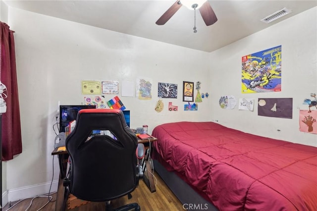 bedroom featuring hardwood / wood-style floors and ceiling fan