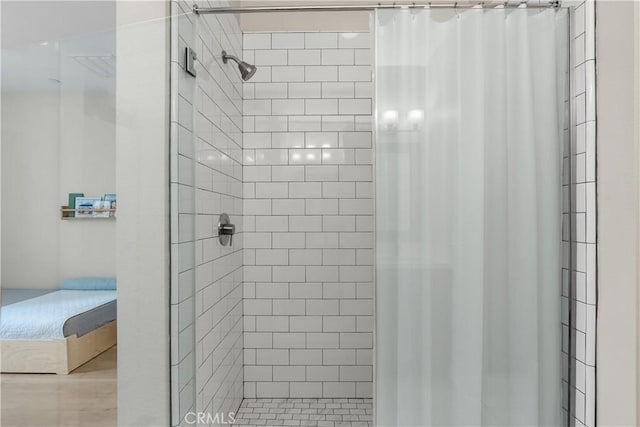 bathroom with a shower with shower curtain