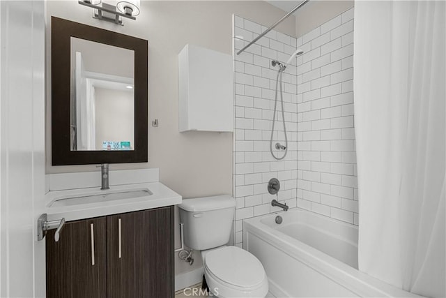 full bathroom featuring toilet, vanity, and shower / bathtub combination with curtain