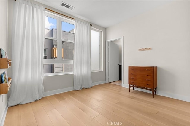 bedroom with light wood-type flooring