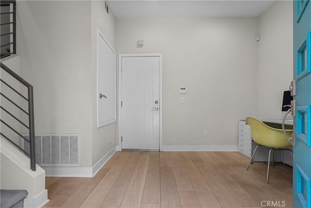 foyer entrance featuring light hardwood / wood-style floors