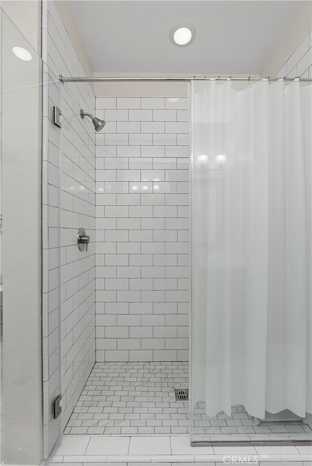 bathroom with a shower with shower curtain