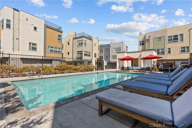 view of swimming pool with a patio