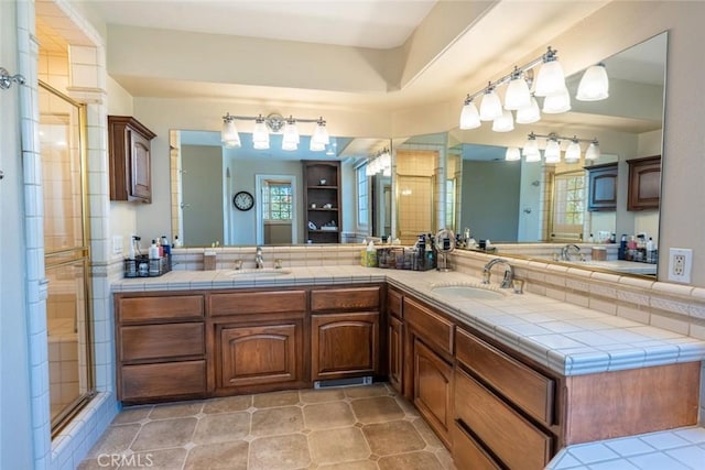 bathroom featuring vanity and walk in shower