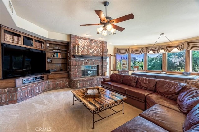 carpeted living room featuring a brick fireplace, ceiling fan, and billiards