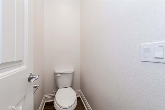 12430 Altura Dr, Rancho Cucamonga, CA 91739 - bathroom with wood-type flooring and toilet