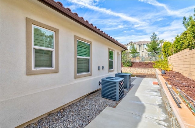 12430 Altura Dr, Rancho Cucamonga, CA 91739 - view of patio featuring central AC unit