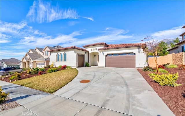12430 Altura Dr, Rancho Cucamonga, CA 91739 - mediterranean / spanish house featuring a garage and a front yard