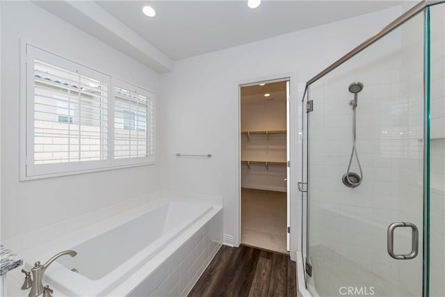 12430 Altura Dr, Rancho Cucamonga, CA 91739 - bathroom with separate shower and tub and hardwood / wood-style floors