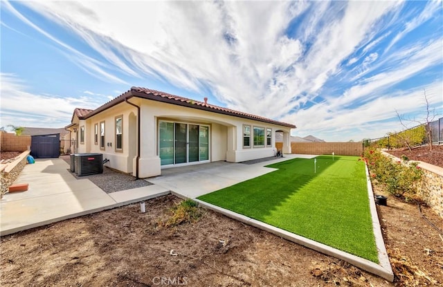 12430 Altura Dr, Rancho Cucamonga, CA 91739 - back of house featuring cooling unit and a patio area