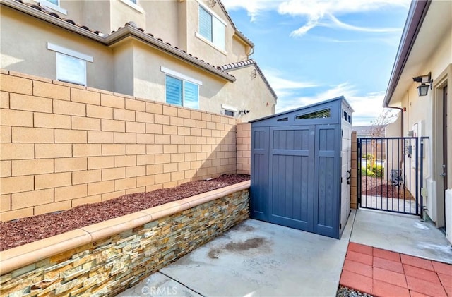 12430 Altura Dr, Rancho Cucamonga, CA 91739 - view of patio with a storage unit