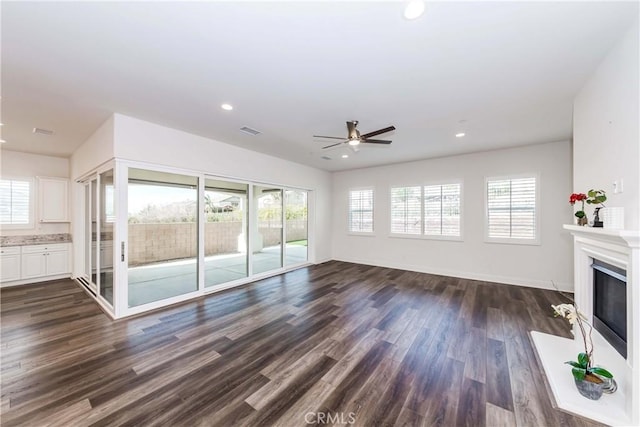 12430 Altura Dr, Rancho Cucamonga, CA 91739 - unfurnished living room with dark wood-type flooring and ceiling fan