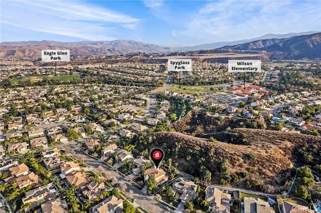 drone / aerial view featuring a mountain view