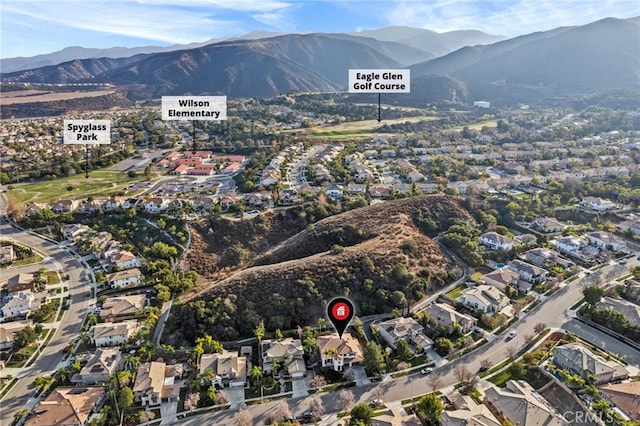 drone / aerial view featuring a mountain view