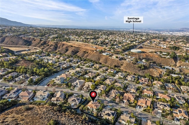 drone / aerial view featuring a mountain view