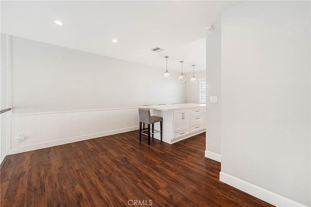 interior space with dark hardwood / wood-style flooring