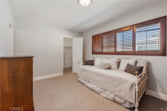 bedroom featuring light carpet