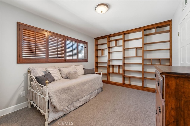 bedroom with light colored carpet