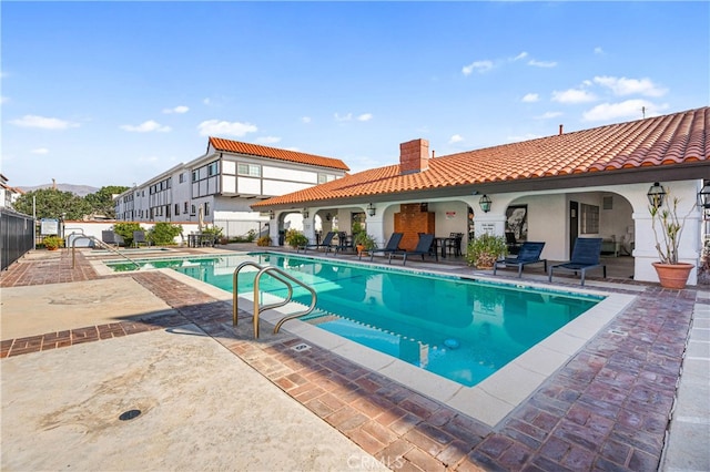 view of pool featuring a patio