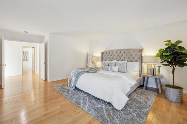 bedroom with light wood-type flooring