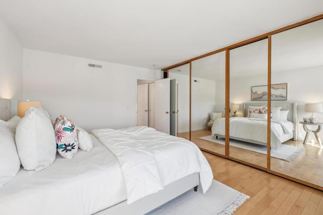 bedroom featuring light hardwood / wood-style floors