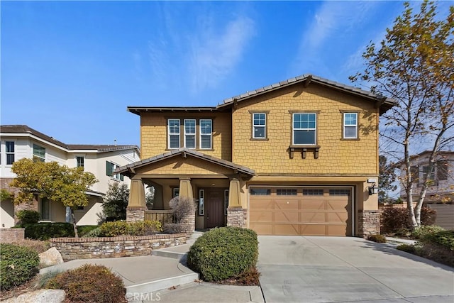 view of front of property with a garage